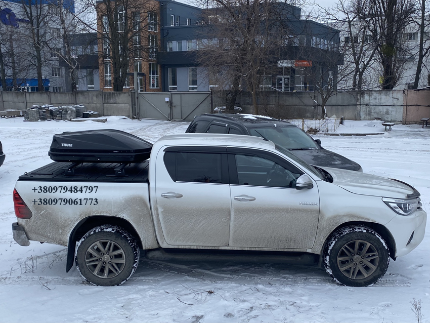 Рейлінги Thule з направляючими для силової кришки кузова пікапа